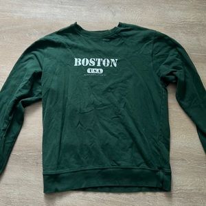 small brandy melville crewneck, slighlty worn (tiny blue stain on it)